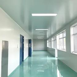 Cleanroom LED Lighting for Pharmaceutical & Semiconductor Facilities in 2026: What Commercial Buyers Actually Need ISO Class 7 laboratory cleanroom with LED ceiling grid lighting