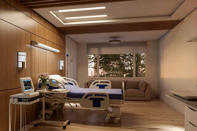 Hospital Lighting in 2026: What Healthcare Facility Buyers Actually Need to Know Hospital patient room with warm LED lighting and natural light