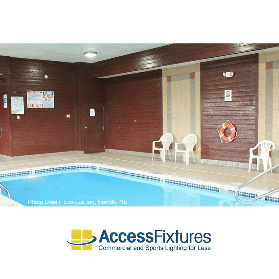 Swimming Pool & Aquatic Facility LED Lighting in 2026: What Commercial Buyers Get Wrong Hotel indoor pool with warm lighting and poolside amenities