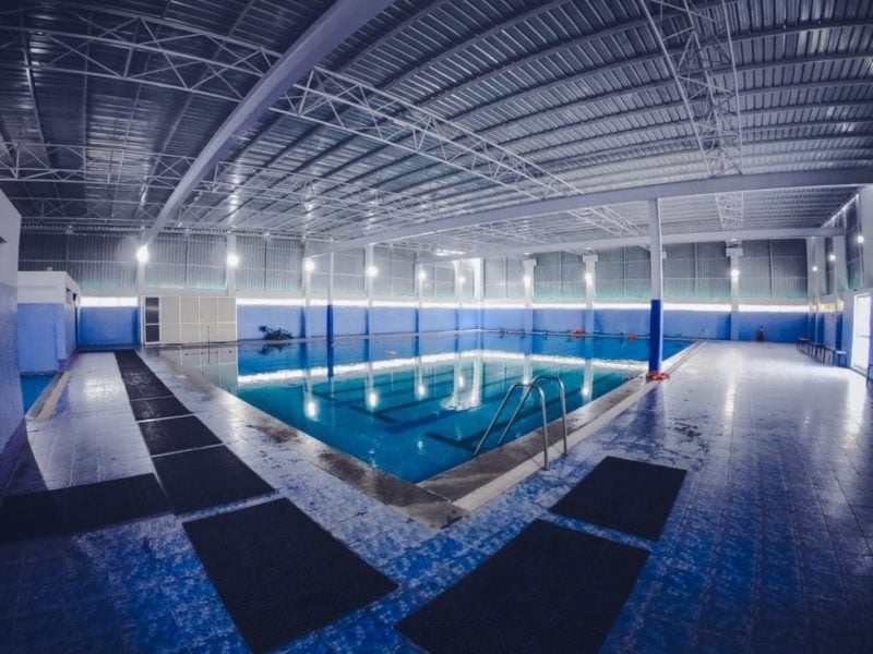 Swimming Pool & Aquatic Facility LED Lighting in 2026: What Commercial Buyers Get Wrong Commercial swimming pool showing underwater and overhead illumination