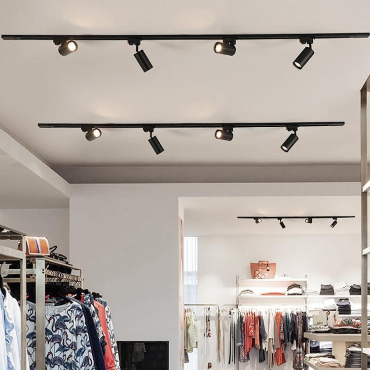 Retail Store Fixture Lighting in 2026: Why Your Shop Looks Wrong Fashion retail store with track lighting system