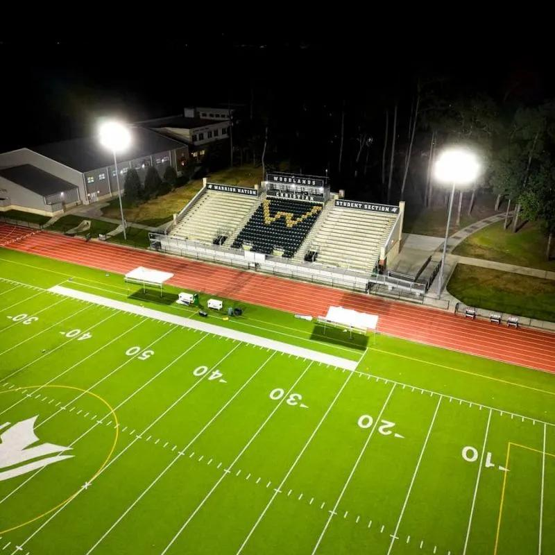Football stadium aerial view showing LED illumination patterns