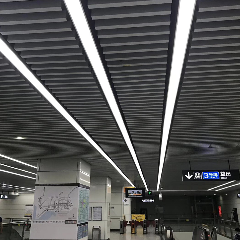 Transit and Railway Station Lighting in 2026: The Spec Decisions That Separate Real Professionals from Amateurs Modern train station platform with LED linear lighting systems