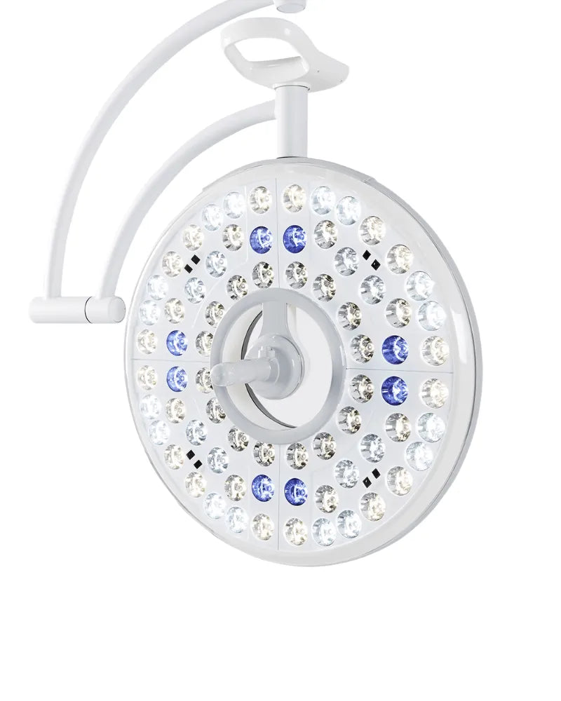 Veterinary surgical shadowless LED light with multiple LED lamp arrays and adjustable suspension arm mounted on a ceiling