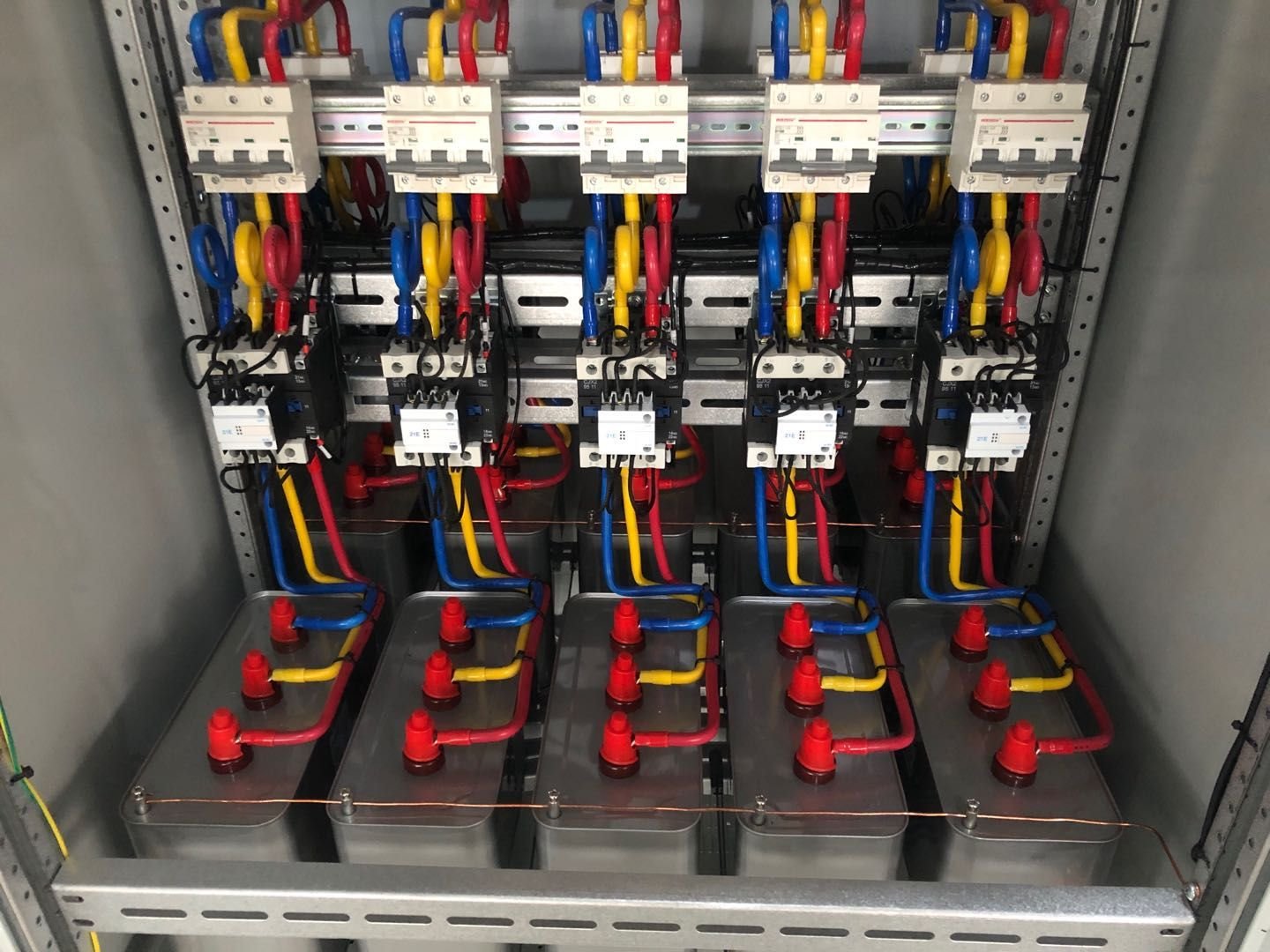 LED Power Factor: The Invisible Spec That's Silently Costing Your Commercial Project Thousands Power factor correction capacitor bank in industrial electrical panel