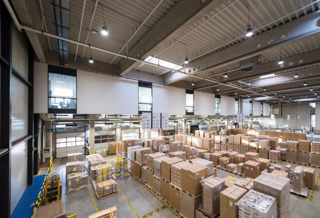 LED Power Factor: The Invisible Spec That's Silently Costing Your Commercial Project Thousands Commercial warehouse with LED high-bay lighting installation