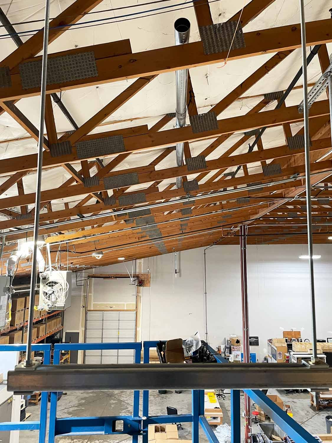 Commercial Lighting Project Management: Why Most Buyers End Up Paying Twice Warehouse ceiling structure